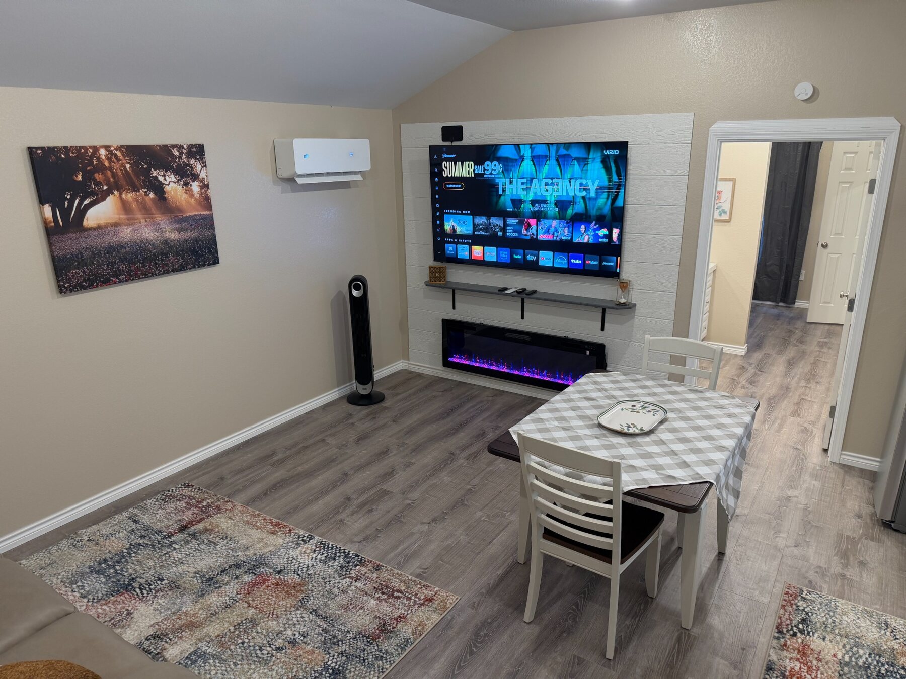 Driscoll B living and dining area with television