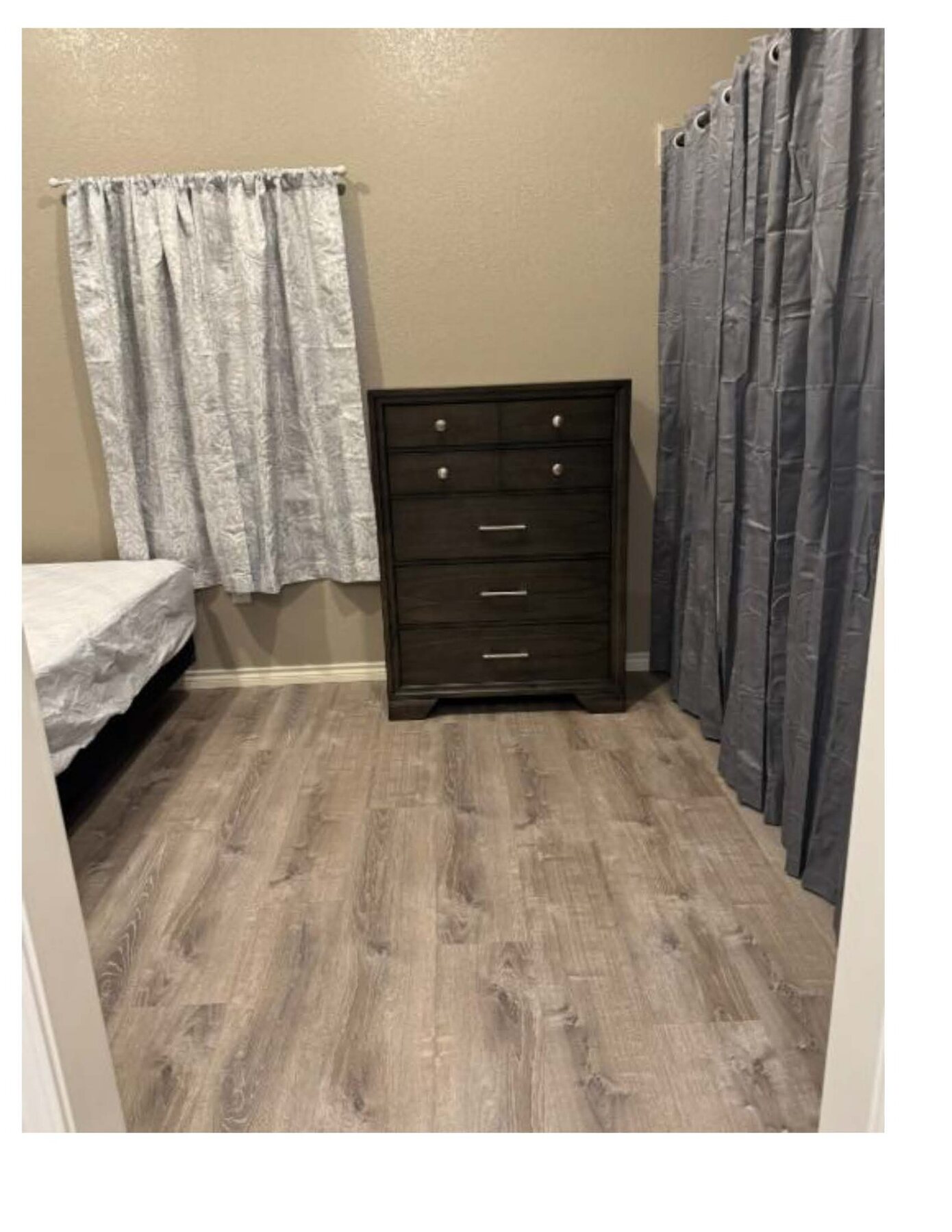 Wren C bedroom dresser and windows