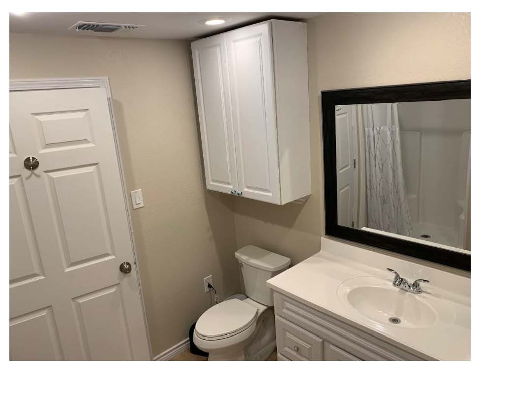 Wren E bathroom vanity and toilet